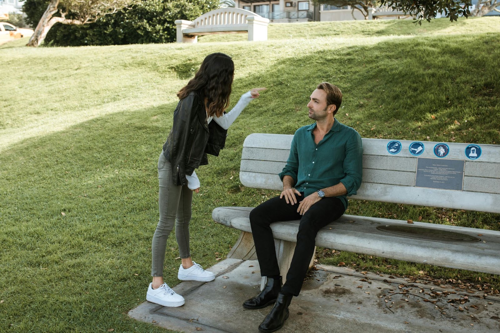 An angry woman talking to a man.
