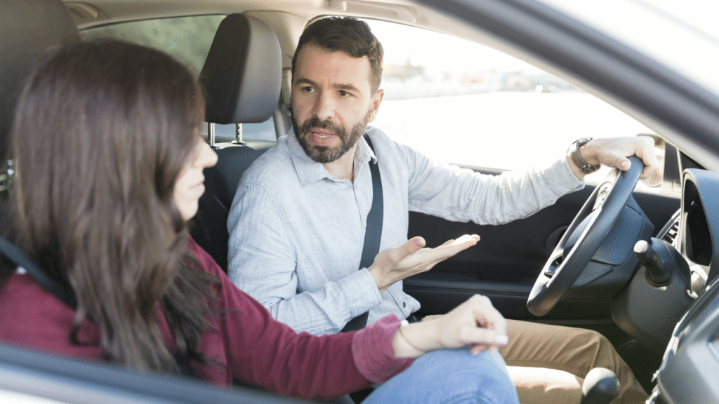 A couple arguing in the car