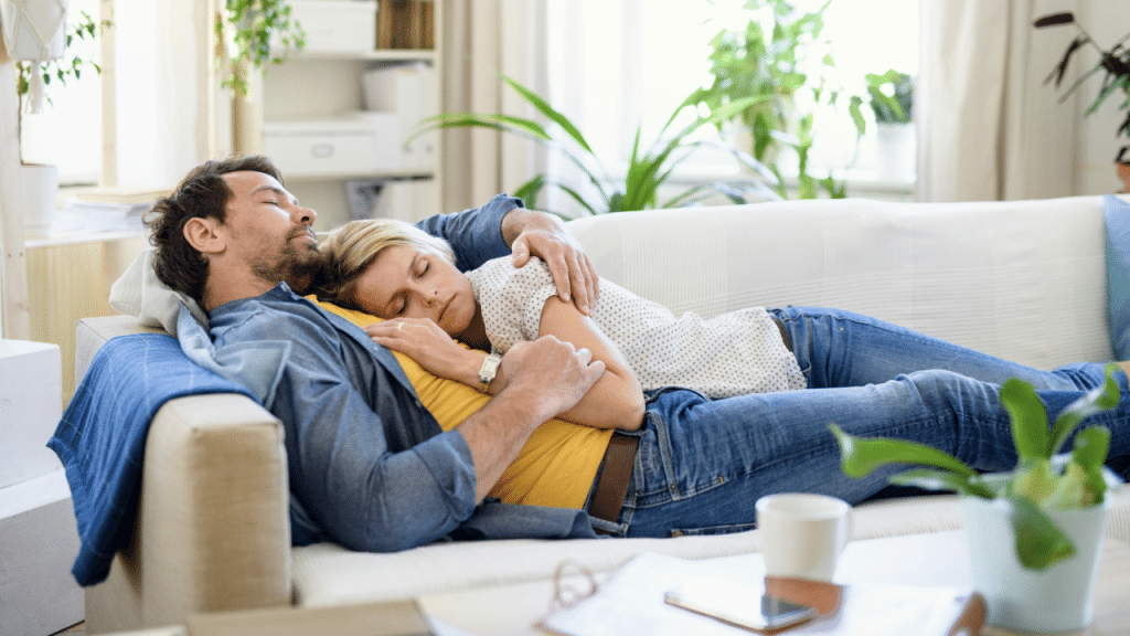 A couple sleeping at home