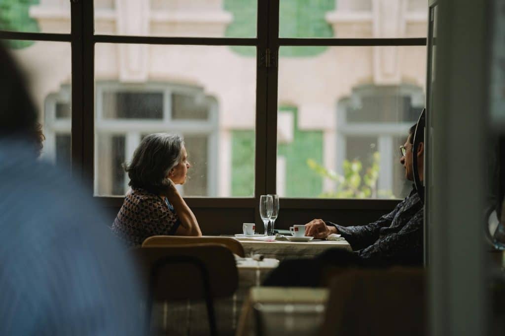 A man and woman having a casual lunch