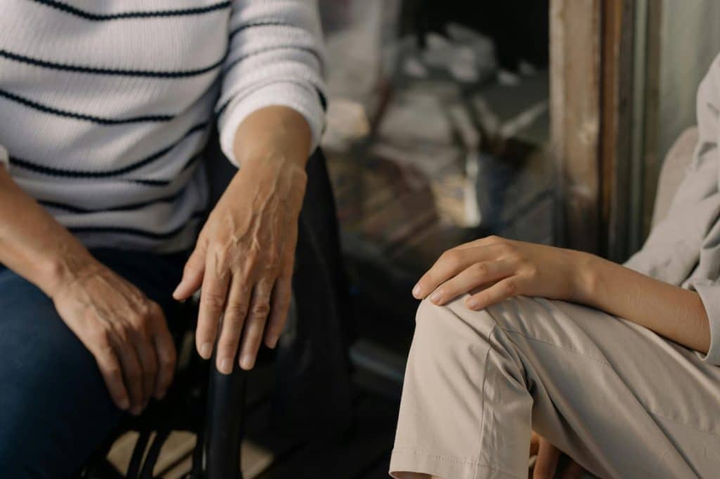 A man and woman walking outside