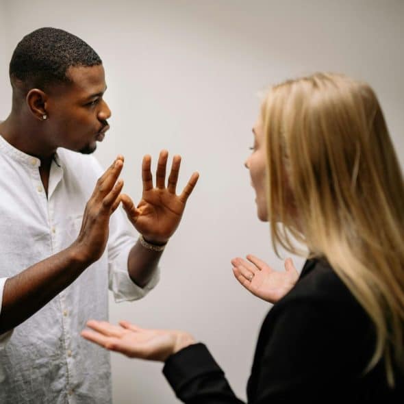 A man and woman having conflict
