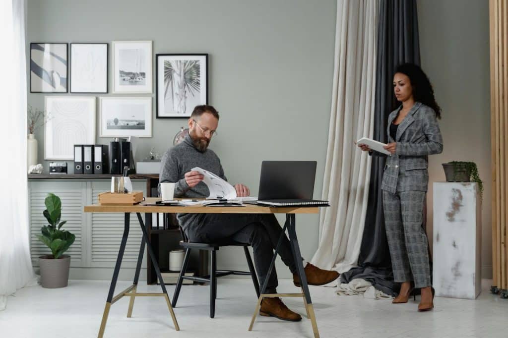 A woman approaching a man