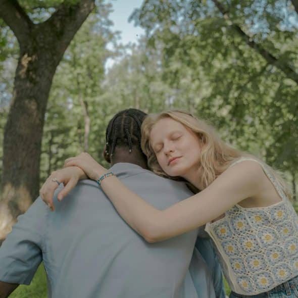 A man and woman hugging