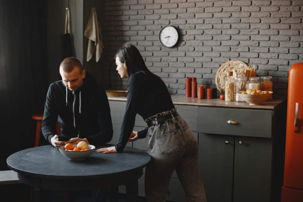 A woman talking to man