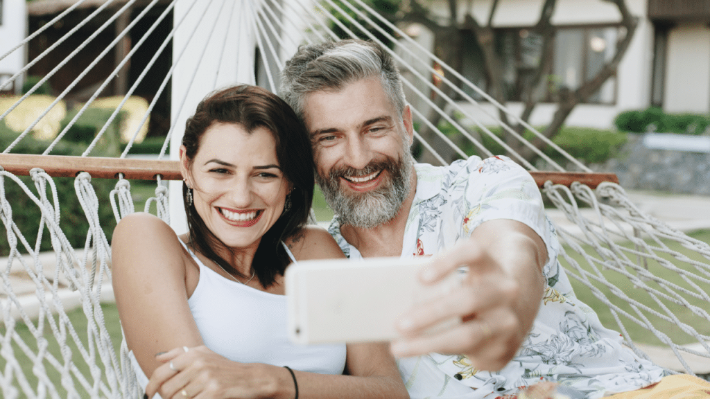 A happy couple taking a selfie