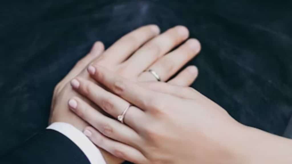 Hands with simple, elegant rings together