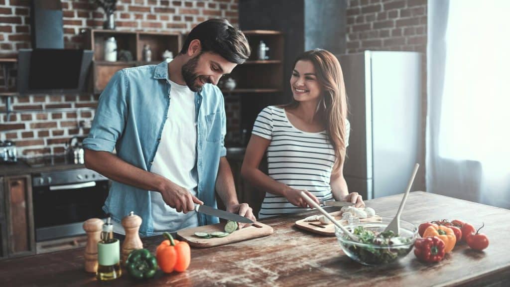 A couple cooking together