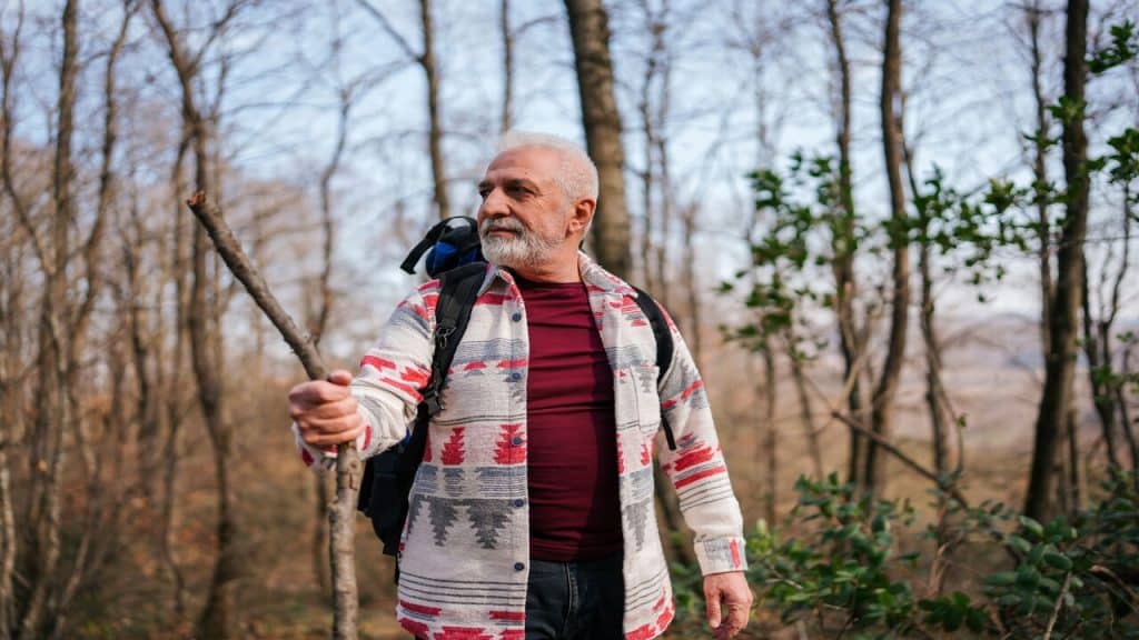 A man hiking by himself.