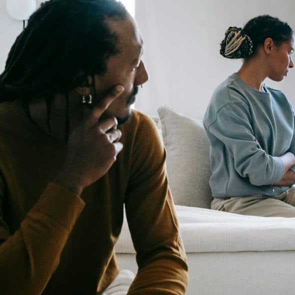 A man and woman having a distance between them