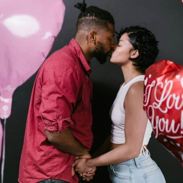 A man and woman kissing
