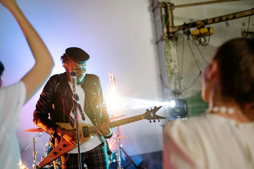 A man and woman at the private concert 