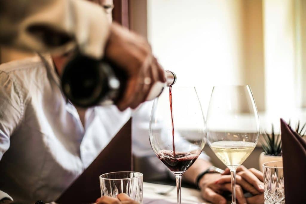 A man and woman having a toast 