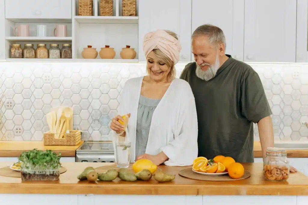 A woman preparing a food for a man