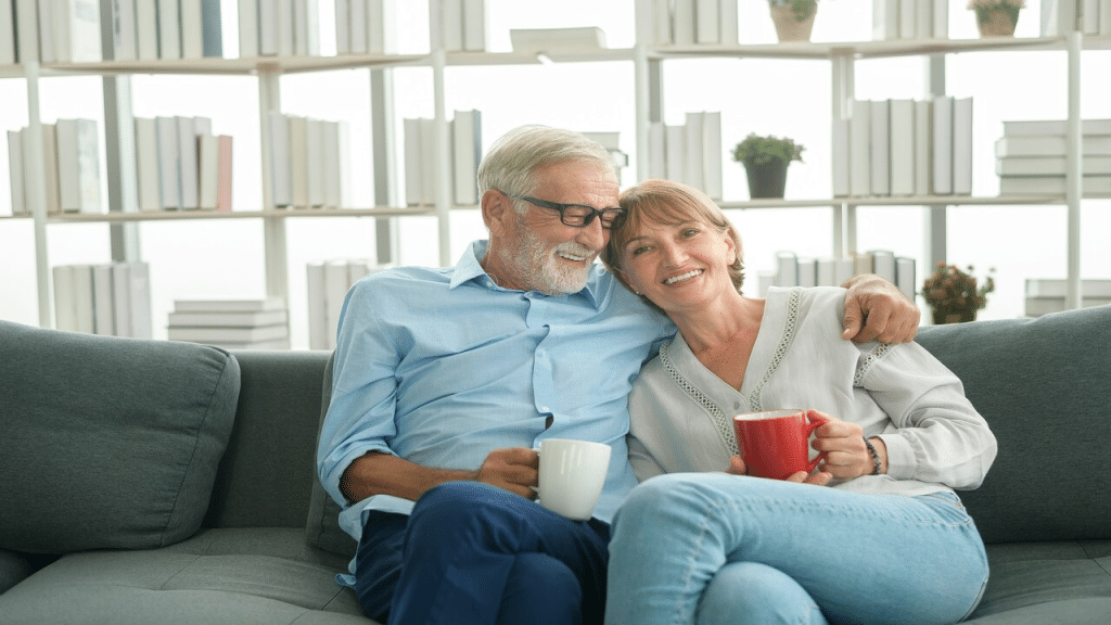 An older couple having coffee together