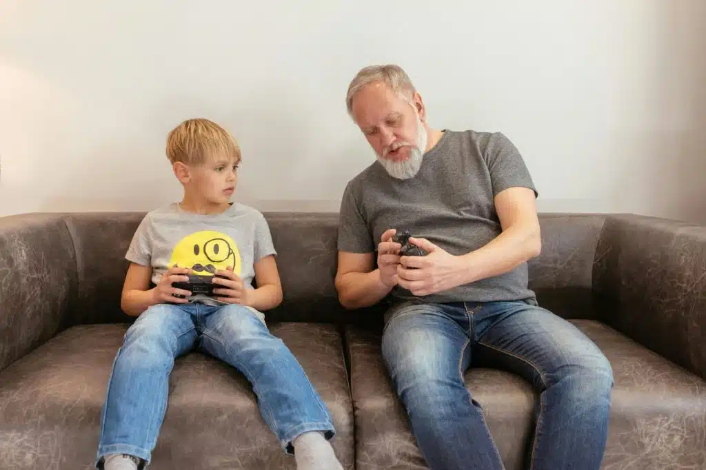 A man having a bonding with his grandson