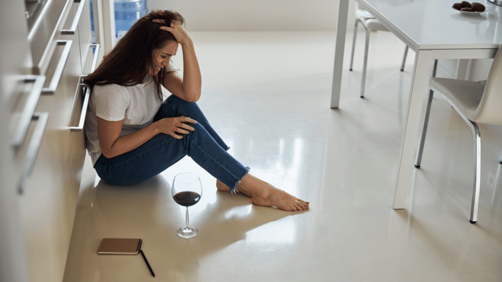 A woman crying by herself at home
