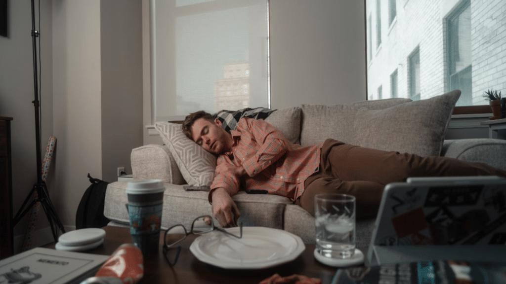 A man sleeping on the couch