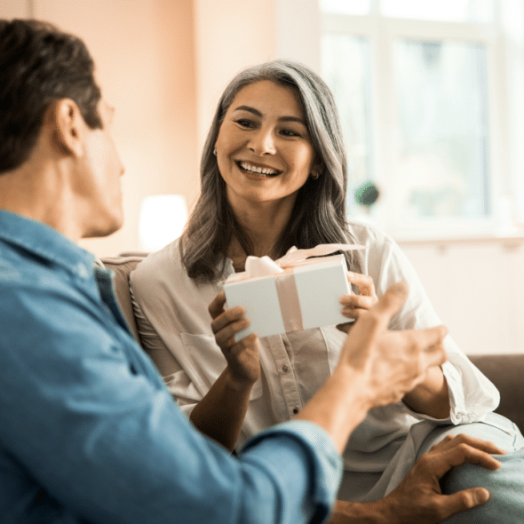 A wife receiving a gift from her husband