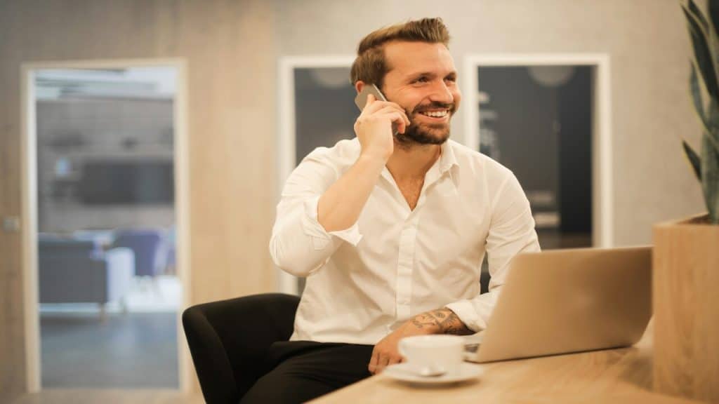 A man on the phone in the office
