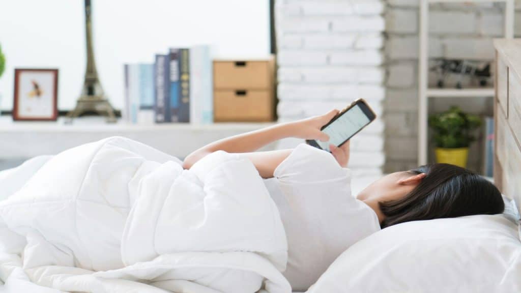 A woman waiting for a text