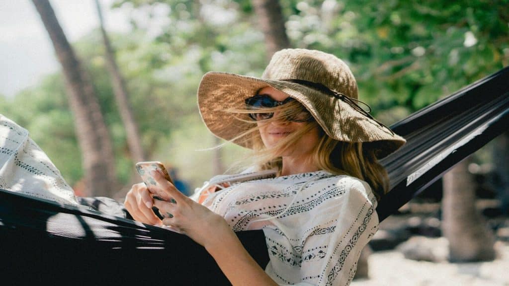 A woman relaxing on a hammock