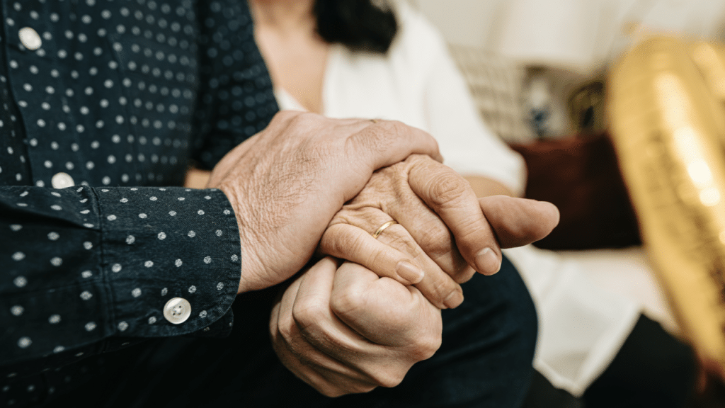 A couple holding hands