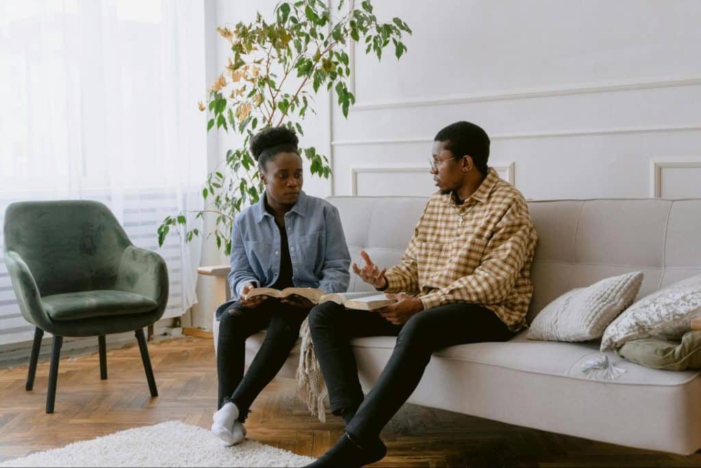 A man and woman talking