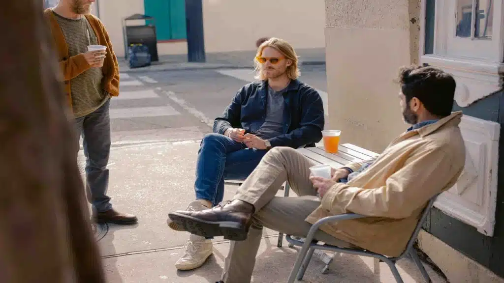 Male friends having beer together