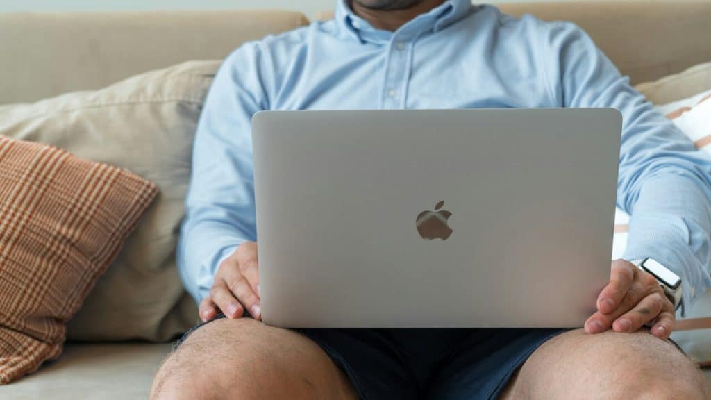 A man using his laptop at home