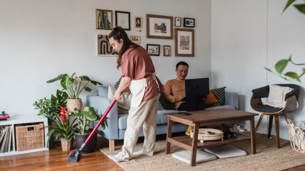 A couple not looking at each other at home