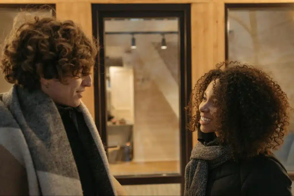 A man and woman talking
