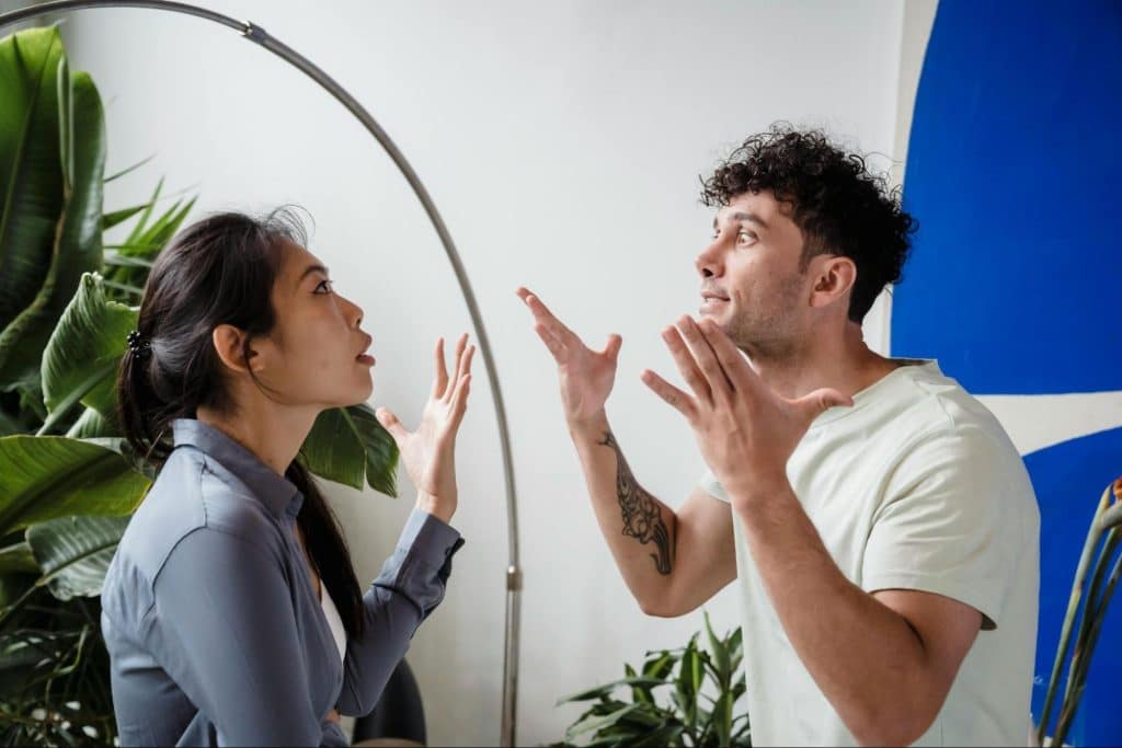 A man and woman being defensive during disagreements 
