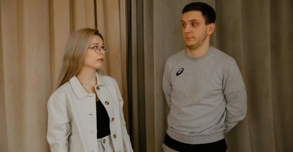 A man and woman looking at each other