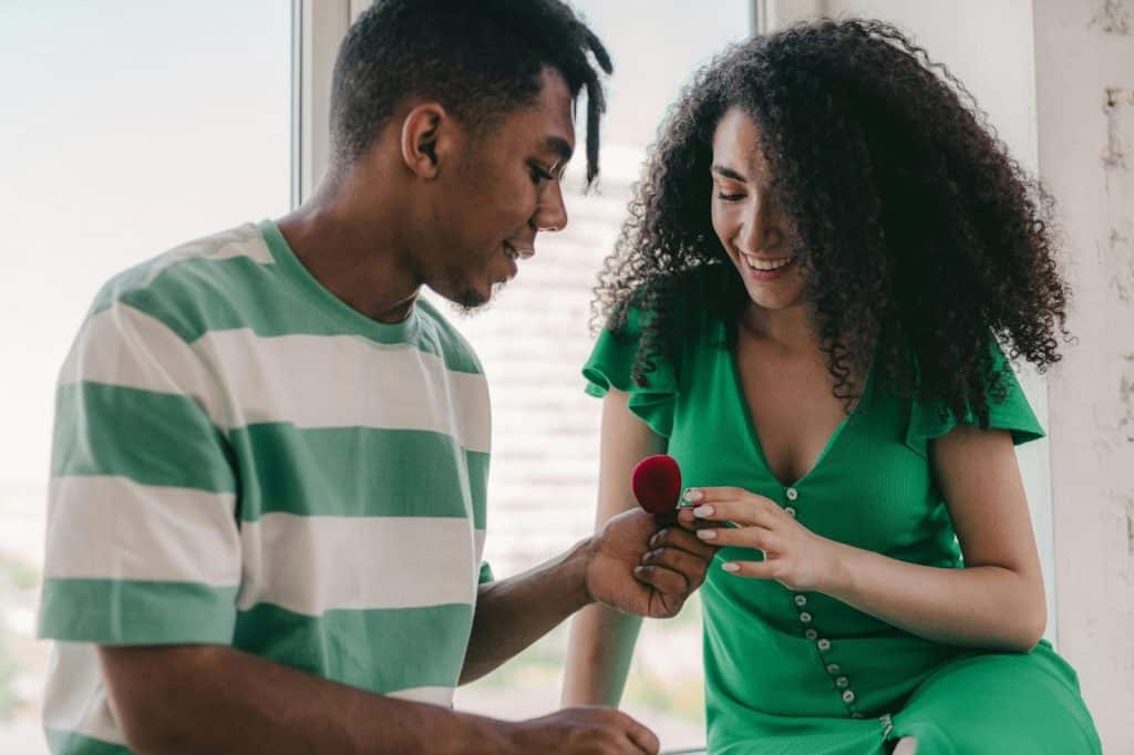 A man giving a woman a gift