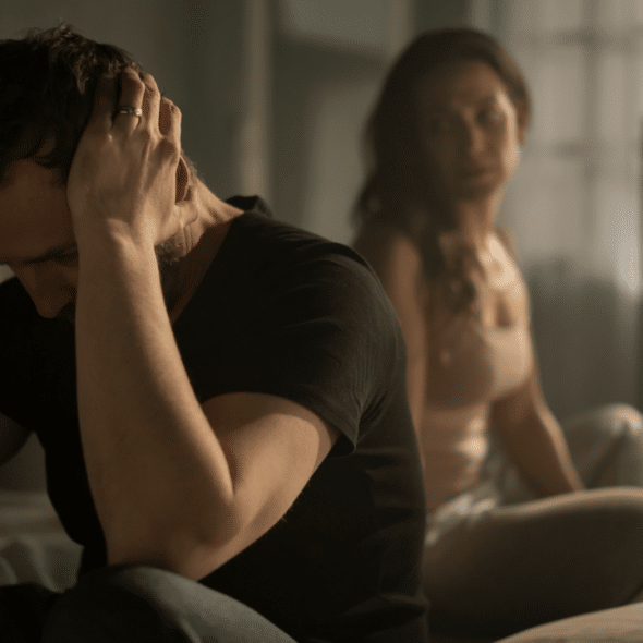 A couple looking sad after a fight