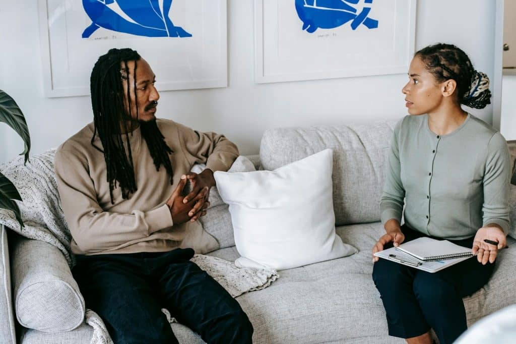 A man and woman talking