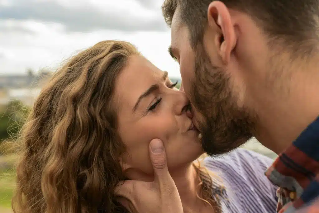 A man and woman kissing