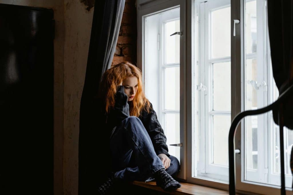 A woman thinking alone