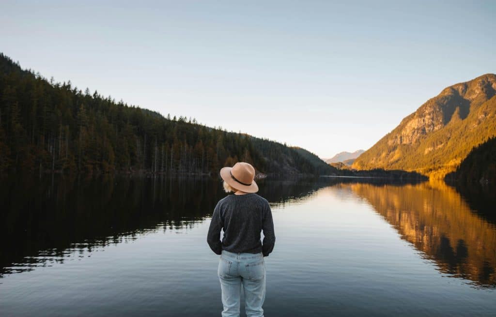 A woman looking at the lake