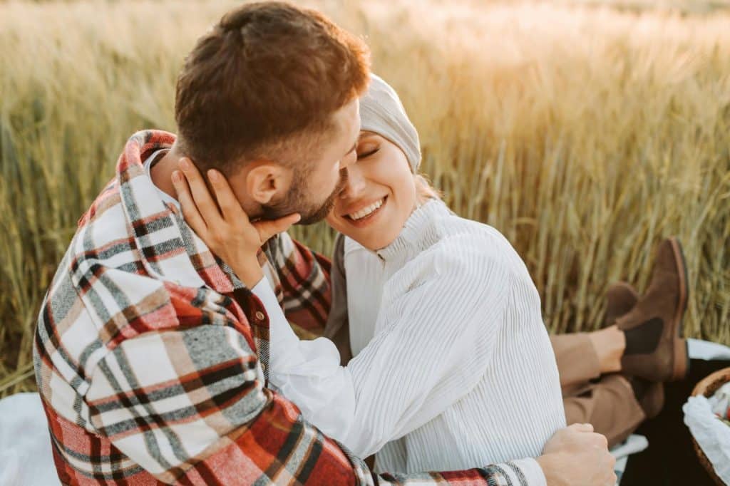 A man and woman cuddling