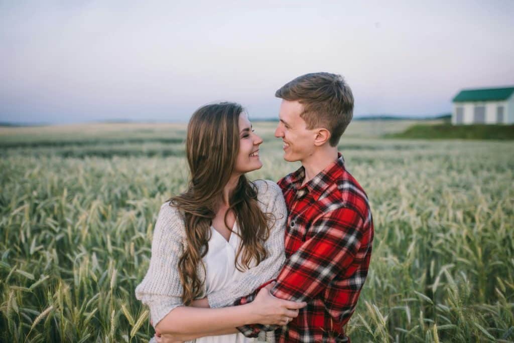 A man and woman looking at each other