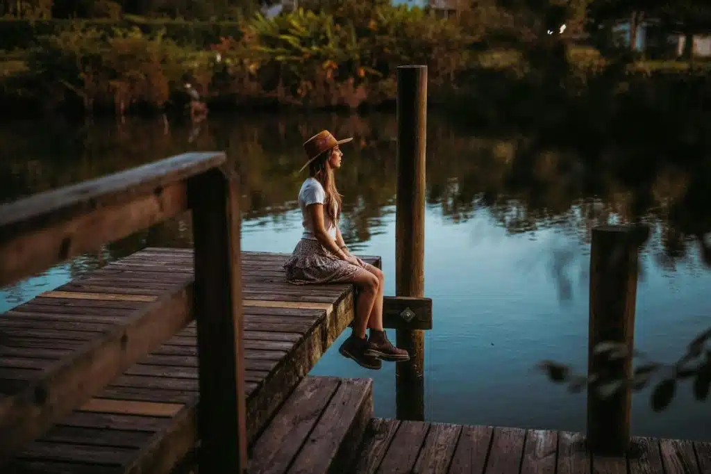 A woman looking at the river