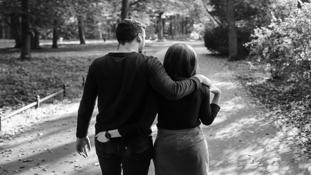 A couple walking in the park