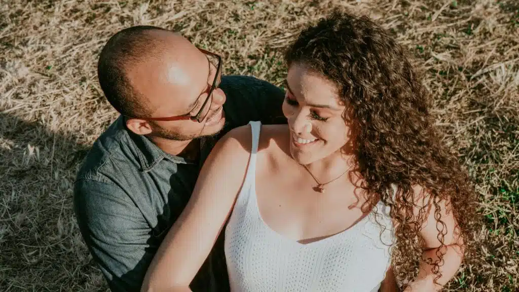 A man looking at the woman