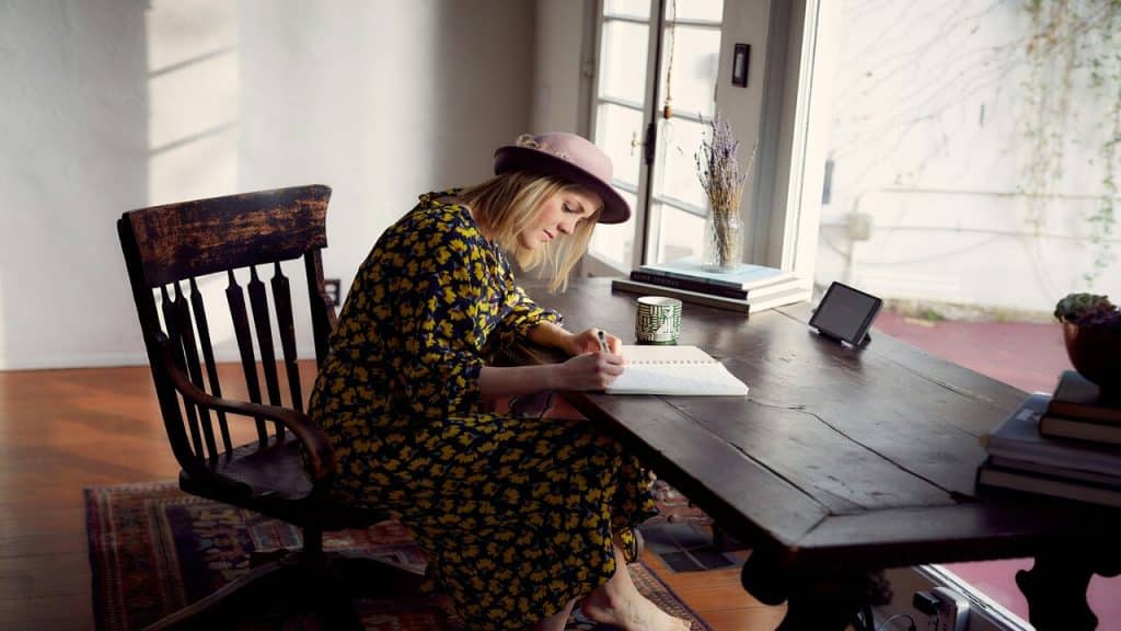 A woman journaling by herself