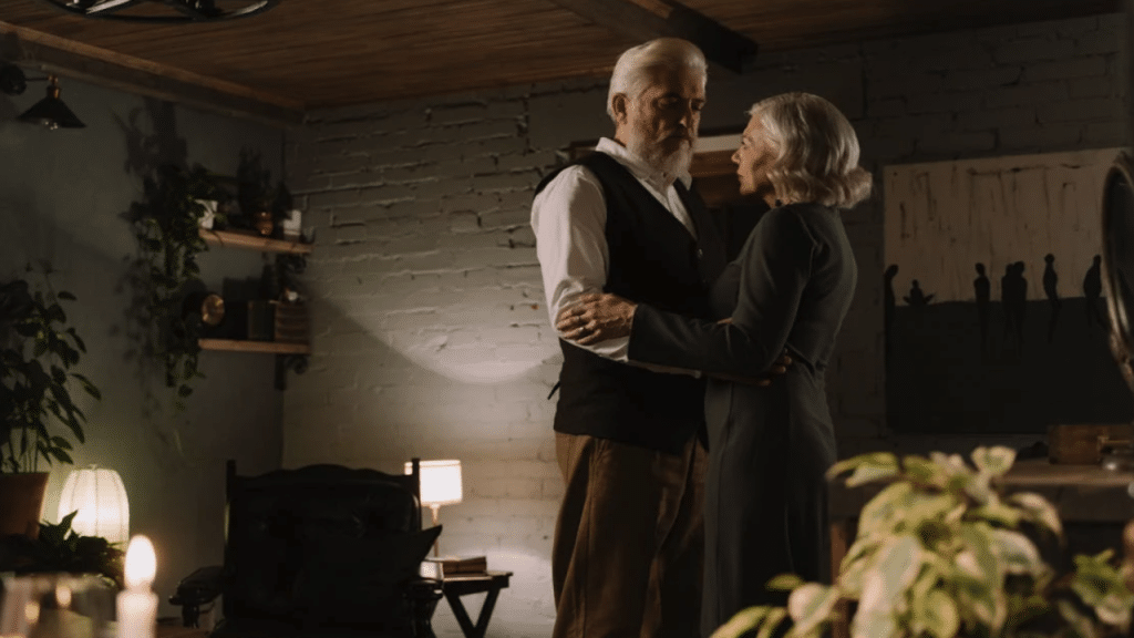 An elderly couple looking sad at home