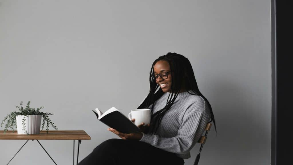 A woman reading at home by herself