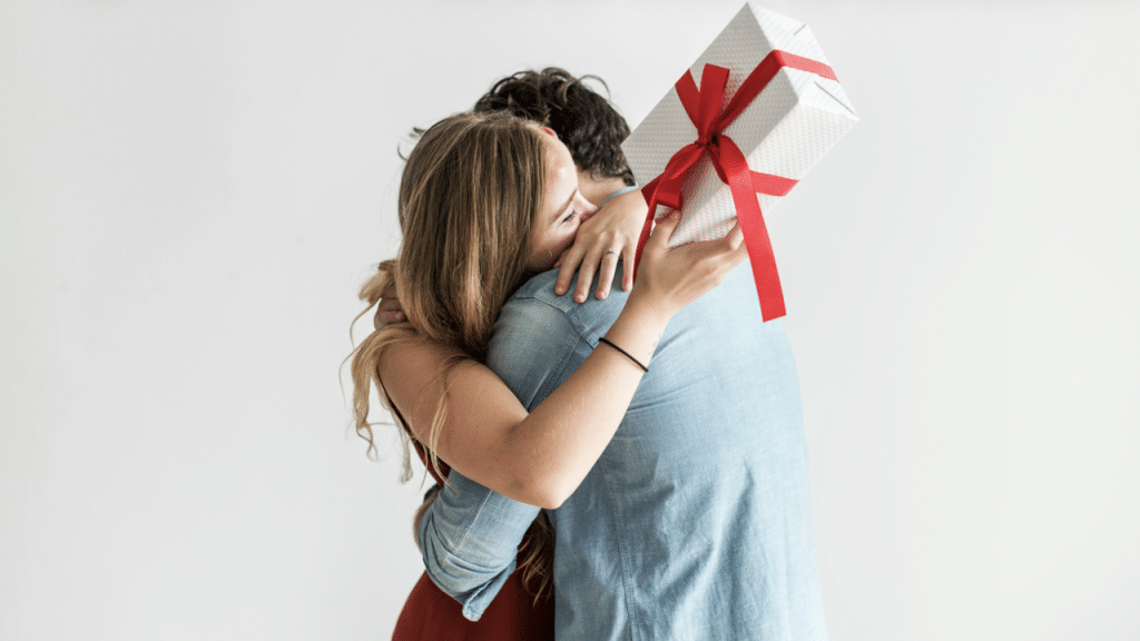 A husband giving his wife a gift