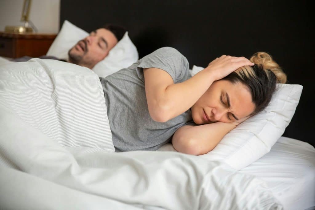 A woman trying to sleep